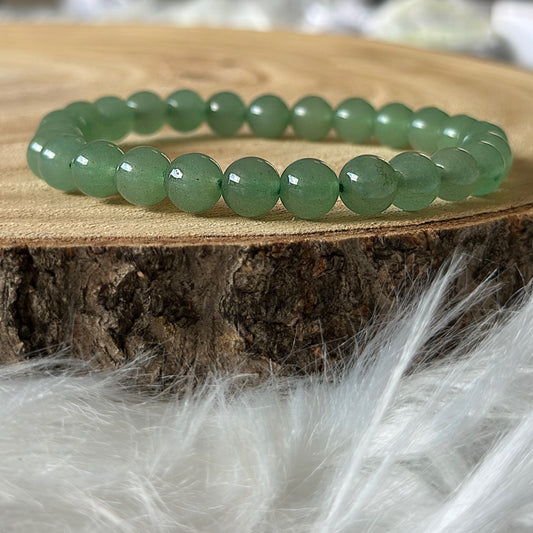 bracelet aventurine verte sur bois et tissu