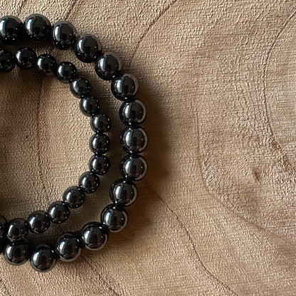 2 bracelets hématite sur bois 