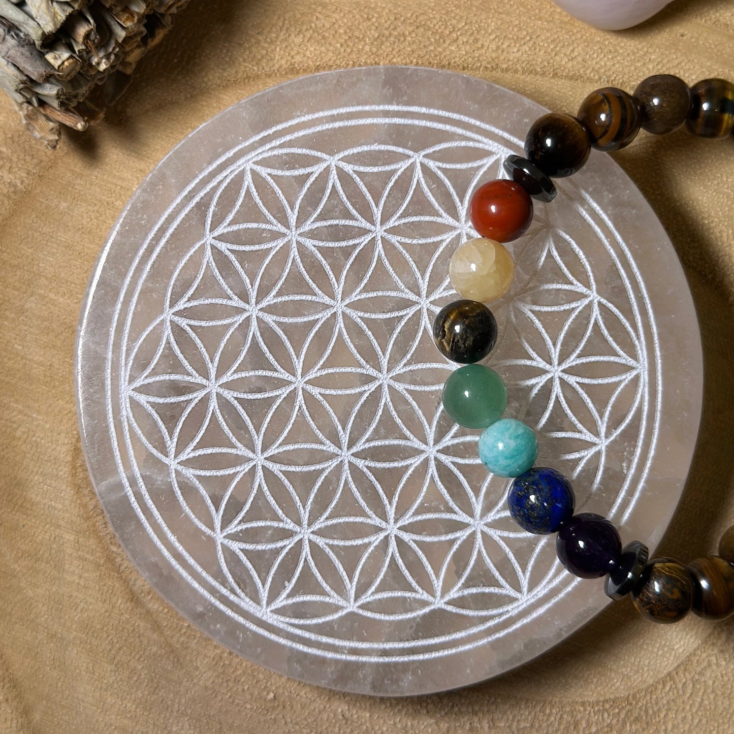 Plaque en sélénite fleur de vie et bracelet œil multiple 
