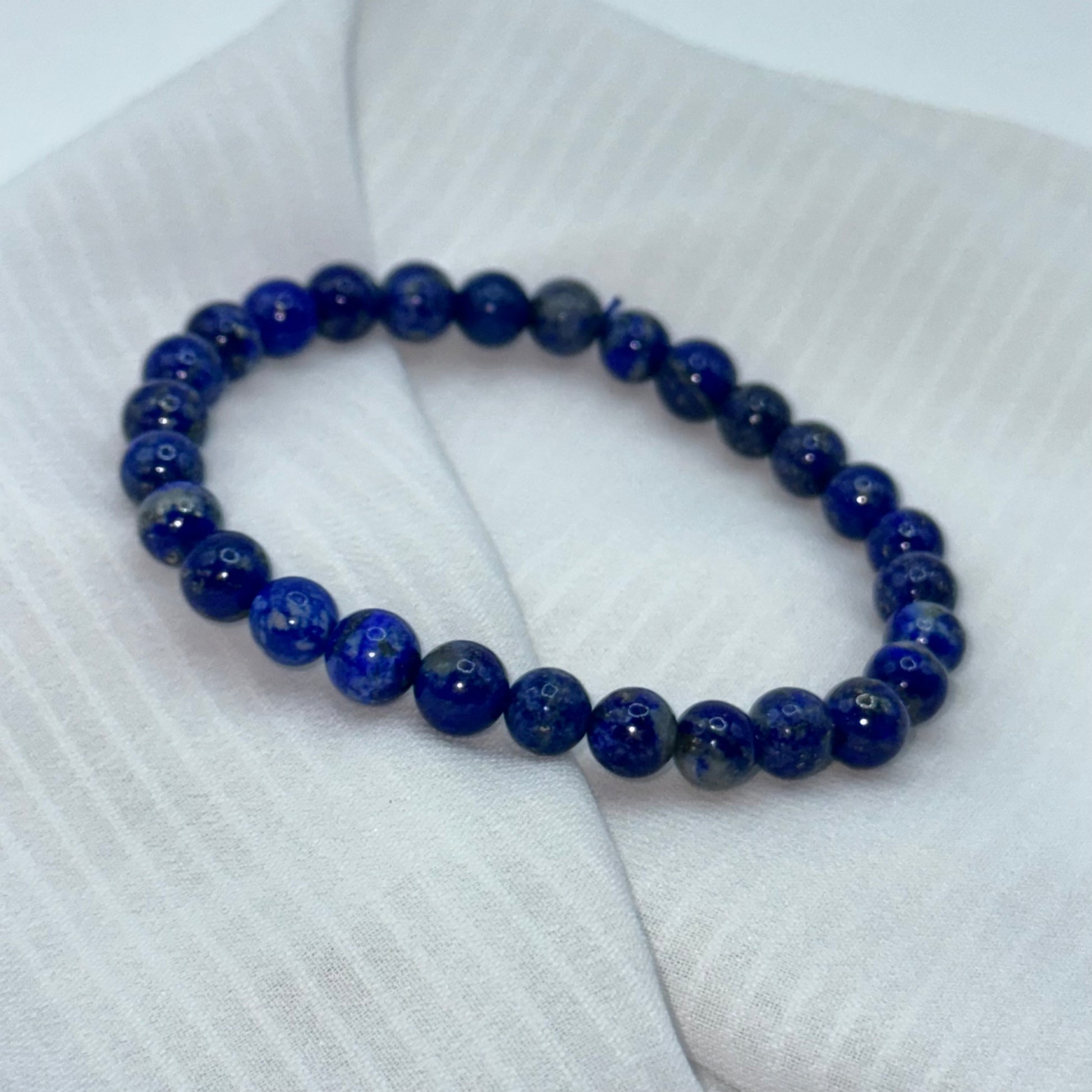 bracelet lapis lazuli 6mm sur soie