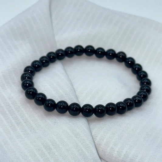 Bracelet Onyx sur soie 
